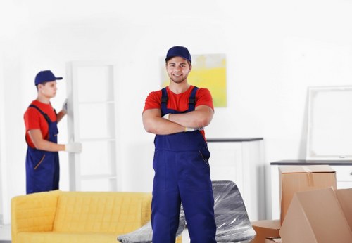 Man with a van loading household items in Bromley