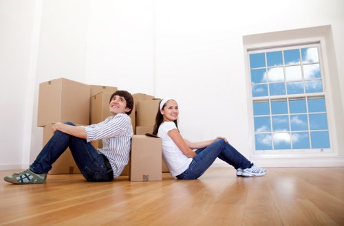Trained removals staff handling furniture carefully during a Bromley van service