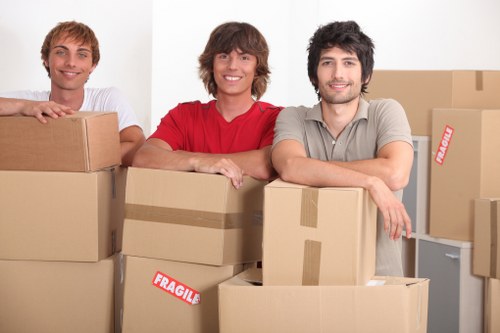 Loading furniture into a van for a Bromley relocation