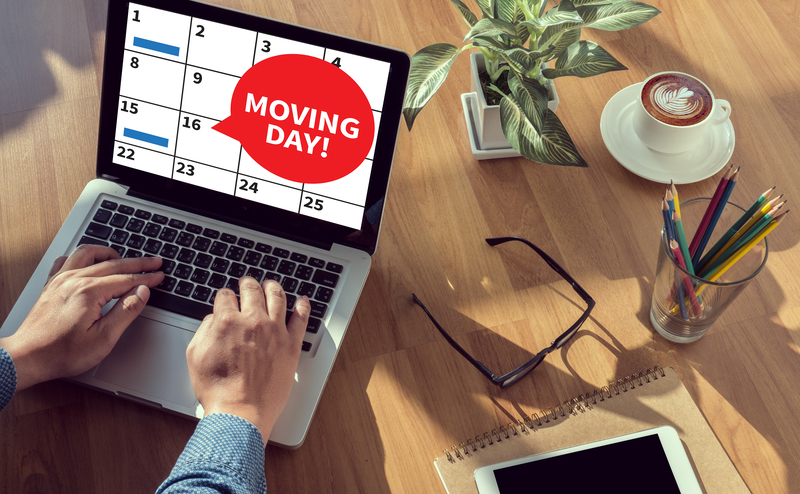 Professional movers handling household items in Bromley